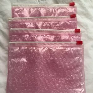 4 New and/or Gently Used Glossier Pink Bubble Bags/Pouches